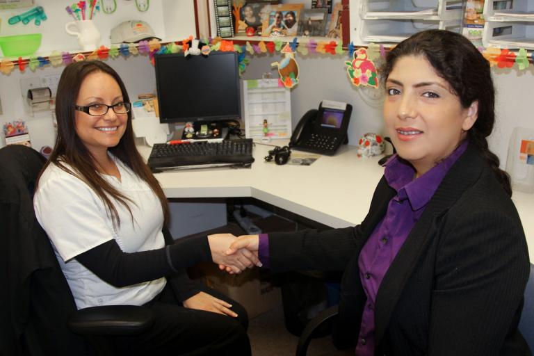 UHC Staff Shaking Hands